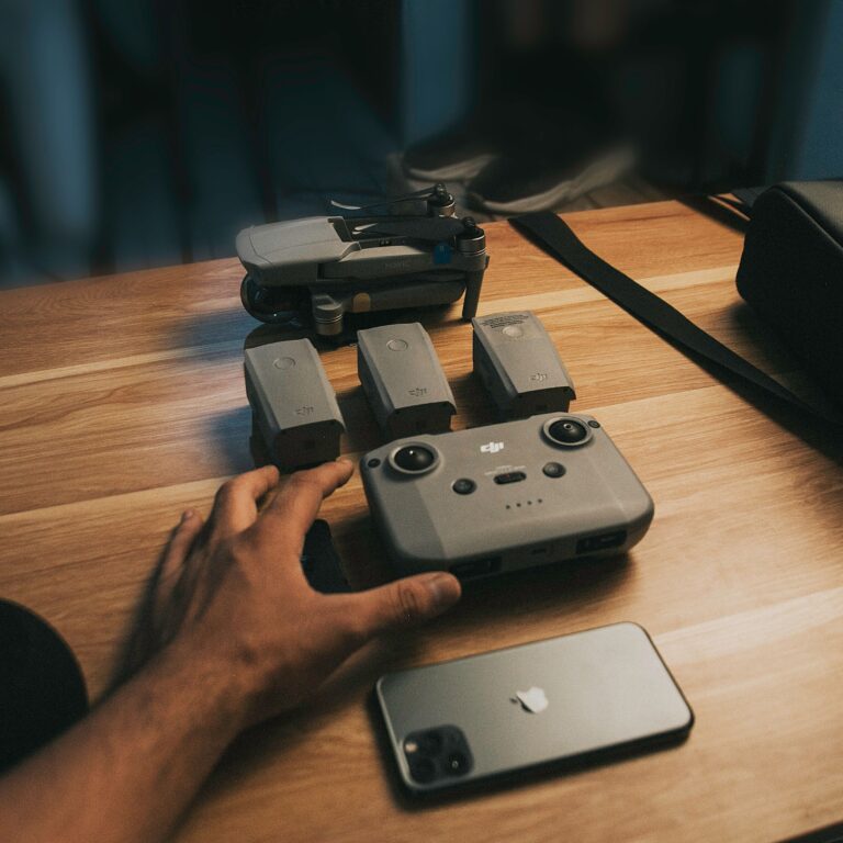 Buying Used FPV Gear: What’s Safe, What’s Not, and the Red Flags Drone with batteries on a wooden table